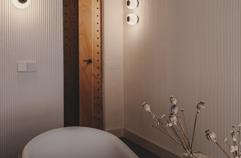 . Mortar-plaster applied manually to the walls with a toothed trowel shows irregularities and blemishes - Oleh Kardash